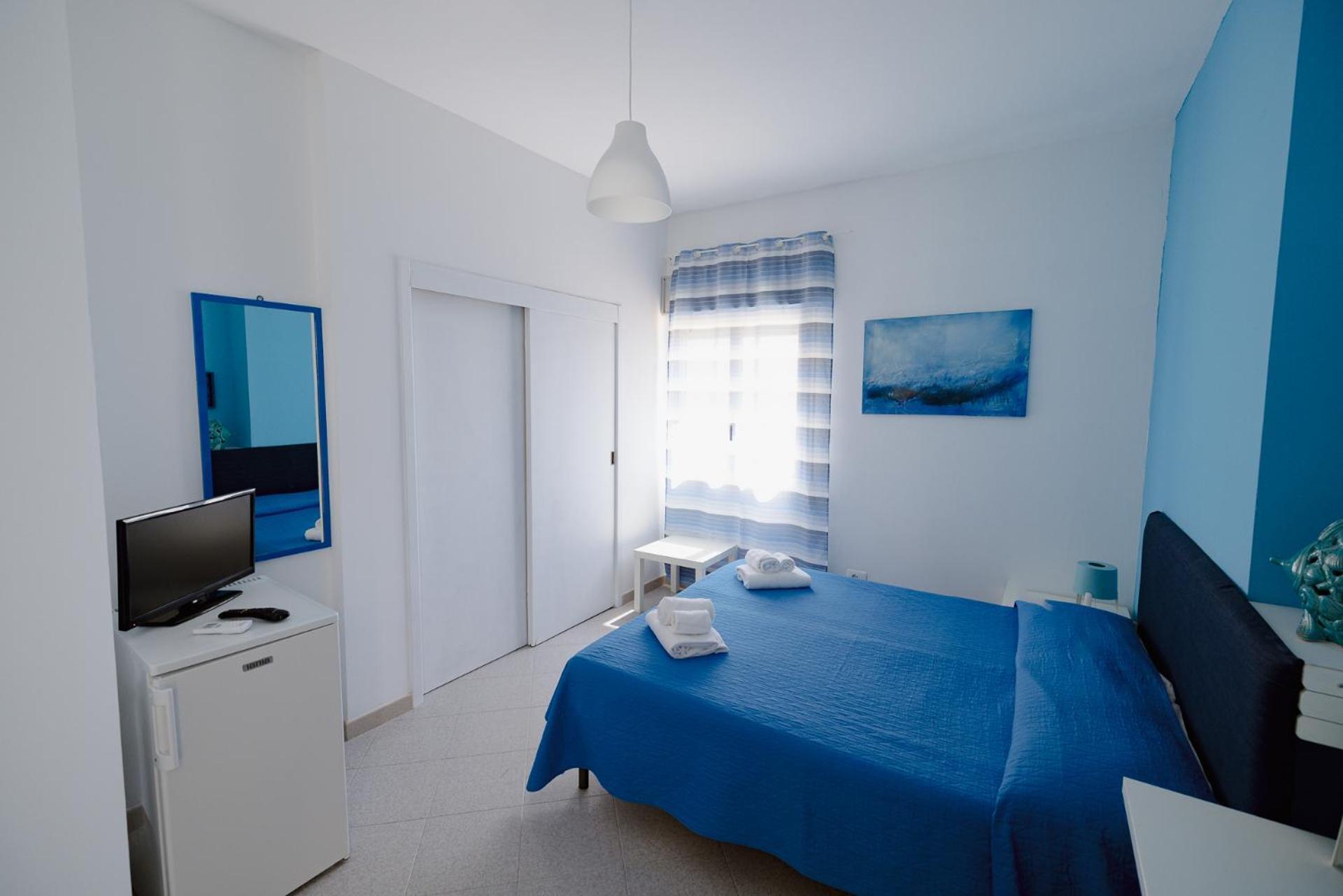 מנפי Residence Le 4 Stagioni מראה חיצוני תמונה